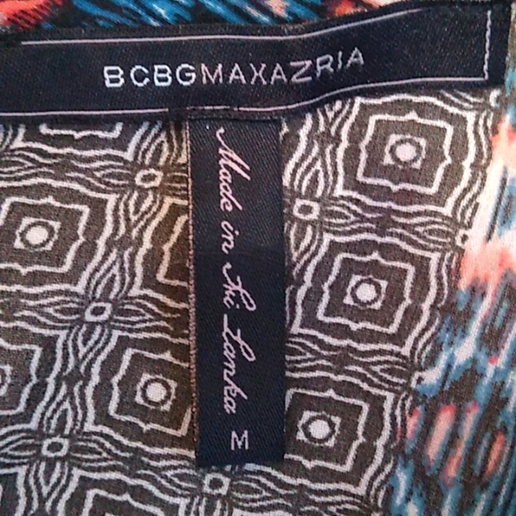 Cold shoulder multi color blouse in like new condition. - Picture 4 of 4